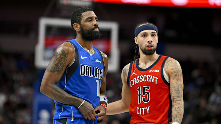 Jan 13, 2024; Dallas, Texas, USA; New Orleans Pelicans guard Jose Alvarado (15) talks with Dallas Mavericks guard Kyrie Irving (11) during the second half at the American Airlines Center. Mandatory Credit: Jerome Miron-Imagn Images Jan 13, 2024; Dallas, Texas, USA; New Orleans Pelicans guard Jose Alvarado (15) talks with Dallas Mavericks guard Kyrie Irving (11) during the second half at the American Airlines Center. Mandatory Credit: Jerome Miron-Imagn Images