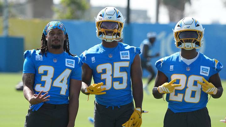 Jul 30, 2026; El Segundo, CA, USA; Los Angeles Chargers running backs Keaton Mitchell (34), Amar Johnson (35) and Kimani Vidal (28) pose at training camp at The Bolt. Mandatory Credit: Kirby Lee-Imagn Images Jul 30, 2026; El Segundo, CA, USA; Los Angeles Chargers running backs Keaton Mitchell (34), Amar Johnson (35) and Kimani Vidal (28) pose at training camp at The Bolt. Mandatory Credit: Kirby Lee-Imagn Images