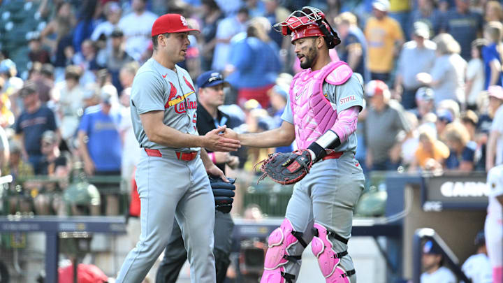May 12, 2024; Milwaukee, Wisconsin, USA; St. Louis Cardinals pitcher Ryan Helsley (56) and St. Louis Cardinals catcher Iván Herrera (48) celebrate a 4-3 win over the Milwaukee Brewers at American Family Field. Mandatory Credit: Michael McLoone-Imagn Images
