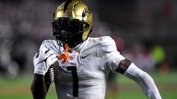 UCF's wide receiver Javon Baker (1) runs for a touchdown against Texas Tech in a Big 12 football