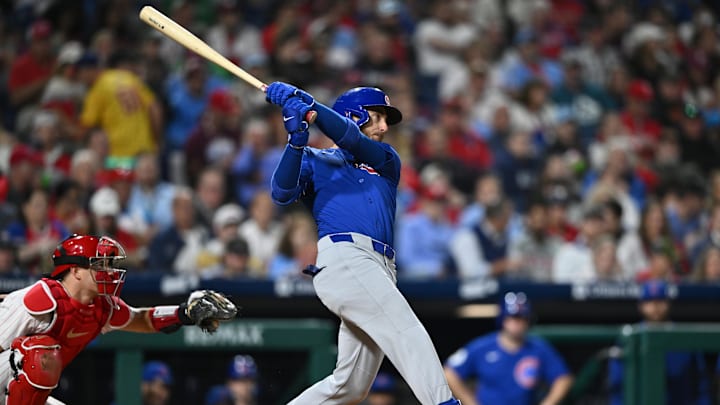 Sep 25, 2024; Philadelphia, Pennsylvania, USA; Chicago Cubs infielder Cody Bellinger (24) hits an RBI single against the Philadelphia Phillies in the fifth inning at Citizens Bank Park. Mandatory Credit: Kyle Ross-Imagn Images