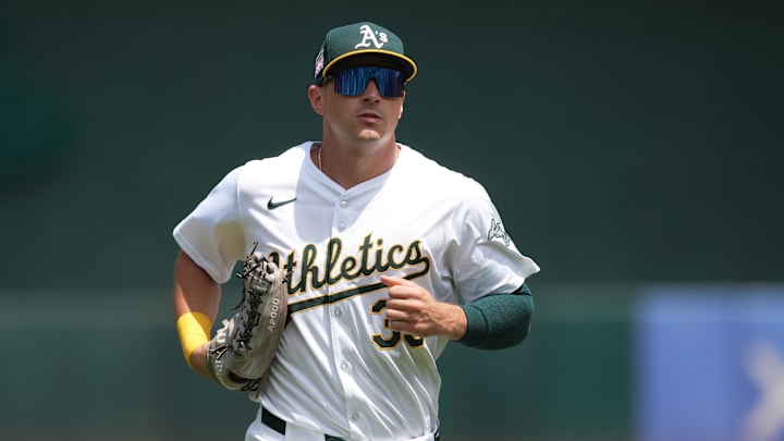 Jul 21, 2024; Oakland, California, USA; Oakland Athletics center fielder JJ Bleday (33) during the fourth inning against the Los Angeles Angels at Oakland-Alameda County Coliseum. Mandatory Credit: Darren Yamashita-Imagn Images