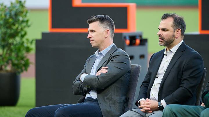 Aug 29, 2026; San Francisco, California, USA; San Francisco Giants president of baseball operations Buster Posey (center) and general manager Zack Minasian look on during a ceremony honoring MLB Hall of Fame member and former Giants player Jeff Kent (not pictured) at Oracle Park.  Mandatory Credit: Robert Edwards-Imagn Images
