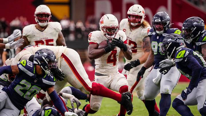 Arizona Cardinals running back Jeremiyah Love (4) runs against the Seattle Seahawks during a game at State Farm Stadium in Glendale, Ariz. on Sept. 20, 2026. Arizona Cardinals running back Jeremiyah Love (4) runs against the Seattle Seahawks during a game at State Farm Stadium in Glendale, Ariz. on Sept. 20, 2026.