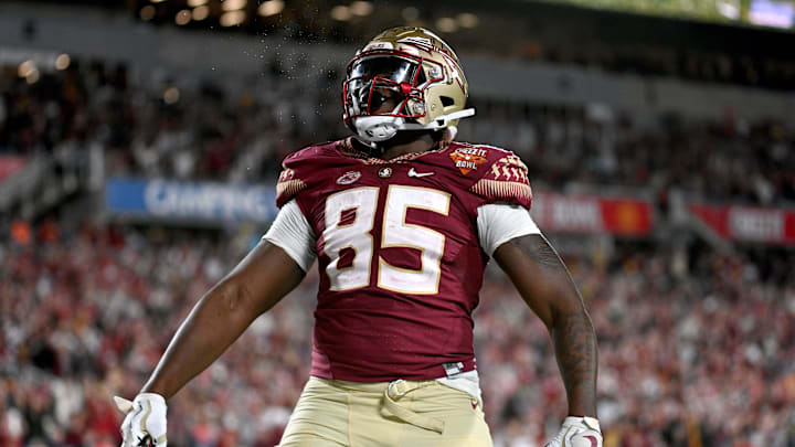 Dec 29, 2022; Orlando, Florida, USA; Florida State Seminoles tight end Markeston Douglas (85) celebrates after scoring a touchdown  in the second half against the Oklahoma Sooners  in the 2022 Cheez-It Bowl at Camping World Stadium. Mandatory Credit: Jonathan Dyer-Imagn Images