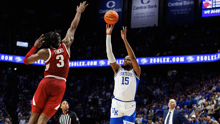 Feb 1, 2025; Lexington, Kentucky, USA; Kentucky Wildcats forward Ansley Almonor (15) shoots the ball over Arkansas Razorbacks forward Adou Thiero (3) during the second half at Rupp Arena at Central Bank Center. Mandatory Credit: Jordan Prather-Imagn Images