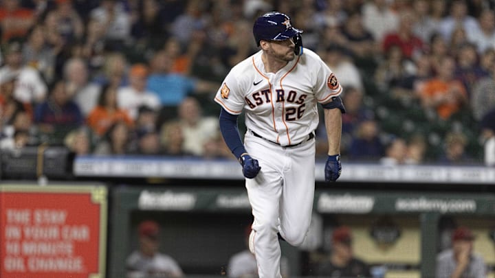 Sep 27, 2022; Houston, Texas, USA; Houston Astros left fielder Trey Mancini (26) hits a sacrifice