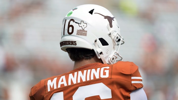 Sep 6, 2025; Austin, Texas, USA; Texas Longhorns quarterback Arch Manning (16) and teammates wear Texas sticker on their helmets with a star honoring Texas flood victims during the game against San Jose State Spartans at Darrell K Royal-Texas Memorial Stadium. Mandatory Credit: Scott Wachter-Imagn Images