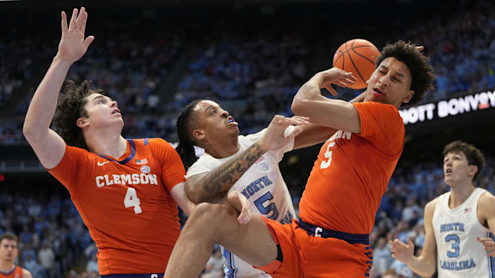 Feb 6, 2024; Chapel Hill, North Carolina, USA; Clemson Tigers forwards Ian Schieffelin (4) and Jack