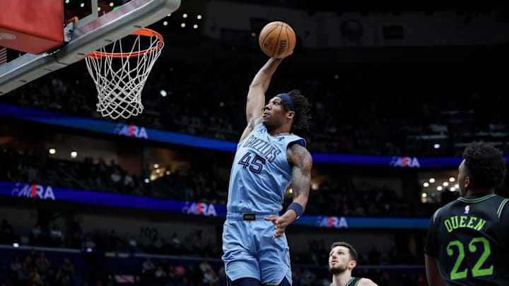 Jan 30, 2026; New Orleans, Louisiana, USA; Memphis Grizzlies forward GG Jackson (45) dunks against New Orleans Pelicans center Derik Queen (22) during the first half at Smoothie King Center. Mandatory Credit: Matthew Hinton-Imagn Images