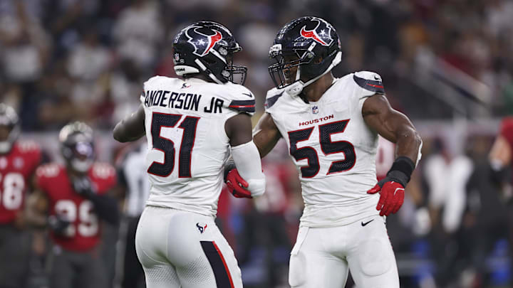 Sep 15, 2025; Houston, Texas, USA; Houston Texans defensive end Will Anderson Jr. (51) celebrates with defensive end Danielle Hunter (55) after a defensive play during the fourth quarter against the Tampa Bay Buccaneers at NRG Stadium. Mandatory Credit: Troy Taormina-Imagn Images