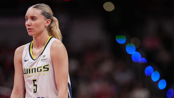 Dallas Wings guard Paige Bueckers (5) stands on the court Tuesday, Aug. 12, 2025, during the game at Gainbridge Fieldhouse in Indianapolis. The Dallas Wings defeated the Indiana Fever, 81-80.
