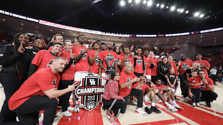 Mar 1, 2025; Houston, Texas, USA; The Houston Cougars  celebrate winning the Big 12 Conference after defeating the Cincinnati Bearcats at Fertitta Center. Mandatory Credit: Thomas Shea-Imagn Images