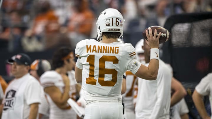 Dec 2, 2023; Arlington, TX, USA; Texas Longhorns quarterback Arch Manning (16) in action during the game between the Texas Longhorns and the Oklahoma State Cowboys at AT&T Stadium. Mandatory Credit: Jerome Miron-Imagn Images