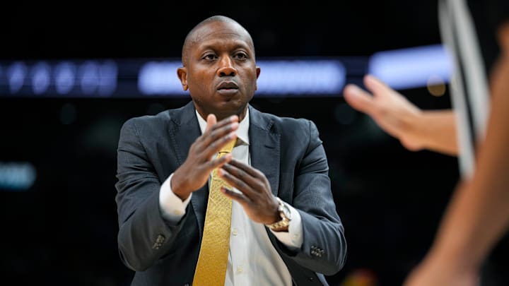 Dec 7, 2025; Kansas City, Missouri, USA; Missouri Tigers head coach Dennis Gates calls for a timeout during the first half against the Kansas Jayhawks at T-Mobile Center.