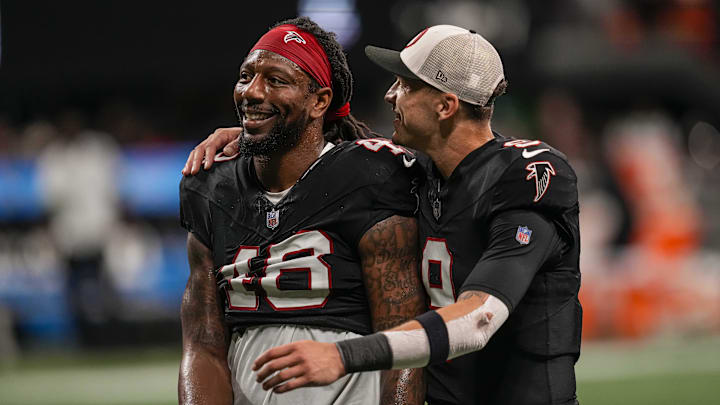 Nov 26, 2023; Atlanta, Georgia, USA; Atlanta Falcons linebacker Bud Dupree (48) and quarterback