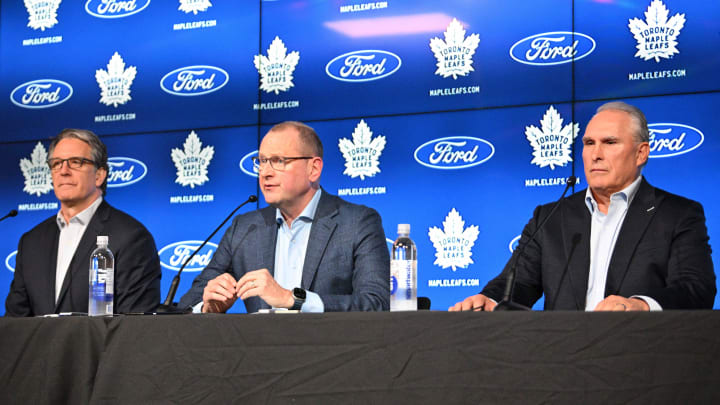 May 21, 2024; Toronto, Ontario, CANADA; Toronto Maple Leafs general manager Brad Treliving (center) and team president Brendan Shanahan (left) introduce new head coach Craig Berube at Ford Performance Centre. Mandatory Credit: Dan Hamilton-USA TODAY Sports May 21, 2024; Toronto, Ontario, CANADA; Toronto Maple Leafs general manager Brad Treliving (center) and team president Brendan Shanahan (left) introduce new head coach Craig Berube at Ford Performance Centre. Mandatory Credit: Dan Hamilton-USA TODAY Sports