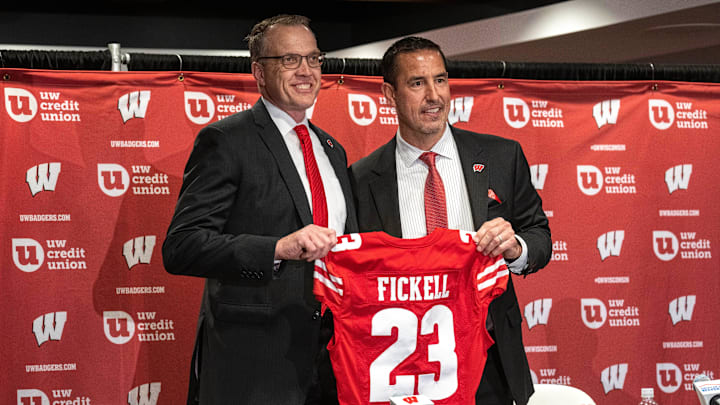 Wisconsin’s new head football coach Luke Fickell, right, is shown with athletic director Chris McIntosh at a news conference Monday, November 28, 2022 at Camp Randall Stadium in Madison, Wis. He was previously head coach for six seasons at Cincinnati. Wisconsin’s new head football coach Luke Fickell, right, is shown with athletic director Chris McIntosh at a news conference Monday, November 28, 2022 at Camp Randall Stadium in Madison, Wis. He was previously head coach for six seasons at Cincinnati.