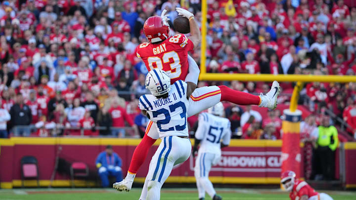 Nov 23, 2025; Kansas City, Missouri, USA; Kansas City Chiefs tight end Noah Gray (83) makes a catch against Indianapolis Colts cornerback Kenny Moore II (23) in the second half  at GEHA Field at Arrowhead Stadium. Mandatory Credit: Denny Medley-Imagn Images