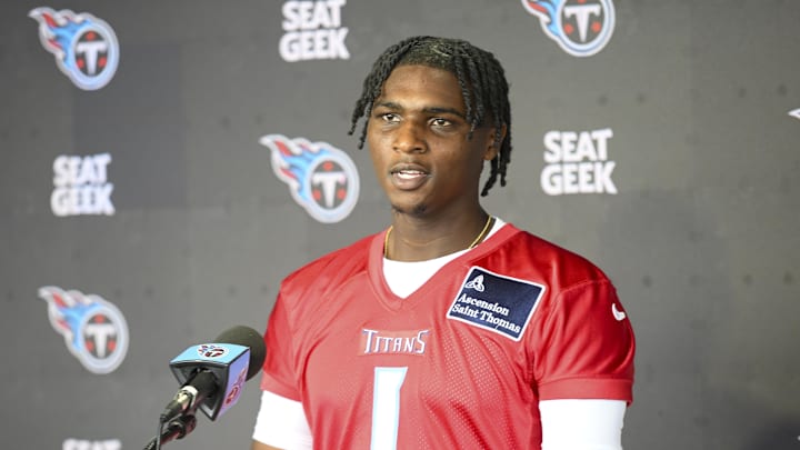 May 10, 2025; Nashville, TN, USA;  Tennessee Titans quarterback Cam Ward (1) talks with reporters after his first day of rookie mini camp  at Saint Thomas Sports Park. Mandatory Credit: Steve Roberts-Imagn Images