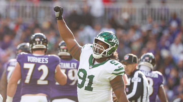 Nov 23, 2025; Baltimore, Maryland, USA; New York Jets defensive tackle Jowon Briggs (91) celebrates a sack during the second quarter against the Baltimore Ravens at M&T Bank Stadium. Mandatory Credit: Peter Casey-Imagn Images Nov 23, 2025; Baltimore, Maryland, USA; New York Jets defensive tackle Jowon Briggs (91) celebrates a sack during the second quarter against the Baltimore Ravens at M&T Bank Stadium. Mandatory Credit: Peter Casey-Imagn Images