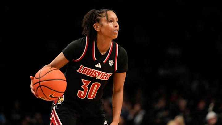 Dec 7, 2024; Brooklyn, New York, USA; Louisville Cardinals guard Jayda Curry (30) dribbles during the second half against the Connecticut Huskies at Barclays Center. Mandatory Credit: Lucas Boland-Imagn Images Dec 7, 2024; Brooklyn, New York, USA; Louisville Cardinals guard Jayda Curry (30) dribbles during the second half against the Connecticut Huskies at Barclays Center. Mandatory Credit: Lucas Boland-Imagn Images