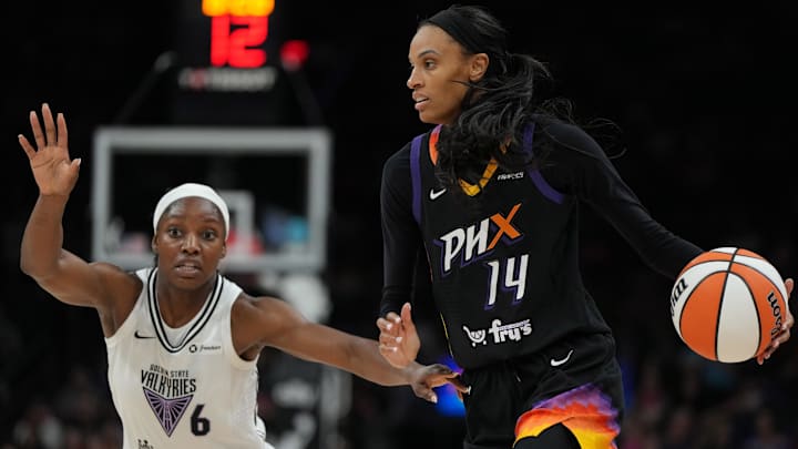 Aug 22, 2025; Phoenix, Arizona, USA; Golden State Valkyries center Temi Fagbenle (14) drives on Golden State Valkyries guard Kaila Charles (6) in the second half at Footprint Center. Mandatory Credit: Rick Scuteri-Imagn Images
