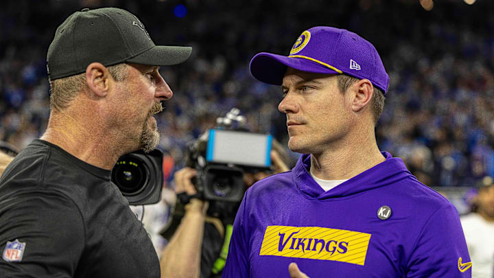 Jan 5, 2025; Detroit, Michigan, USA; Detroit Lions Head Coach Dan Campbell (L) shakes hands with Minnesota Vikings Head Coach Sean McDermott after the game at Ford Field. Mandatory Credit: David Reginek-Imagn Images