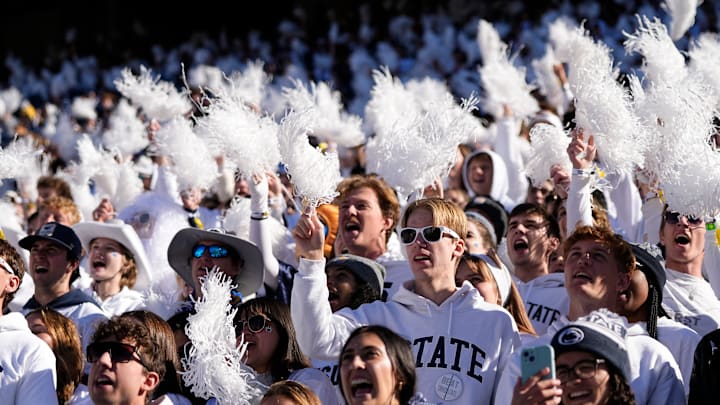 Penn State Nittany Lions students cheer during the first half of the NCAA football game against the Ohio State Buckeyes at Beaver Stadium. 