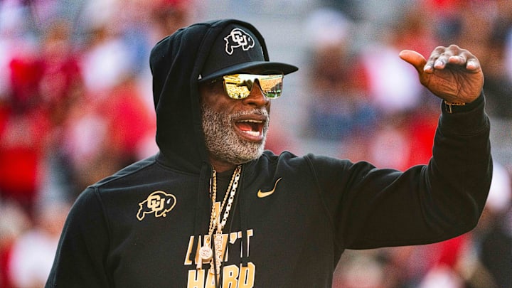 Sep 7, 2024; Lincoln, Nebraska, USA; Colorado Buffaloes head coach Deion Sanders watches warmups before the game against the Nebraska Cornhuskers at Memorial Stadium. Mandatory Credit: Dylan Widger-Imagn Images