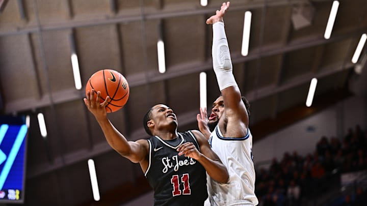 Nov 29, 2023; Villanova, Pennsylvania, USA; Saint Joseph's Hawks guard Xzayvier Brown (11) shoots