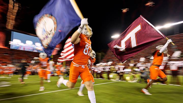 Oct 17, 2024; Blacksburg, Va.; Virginia Tech runs onto the field before paying against Boston College.