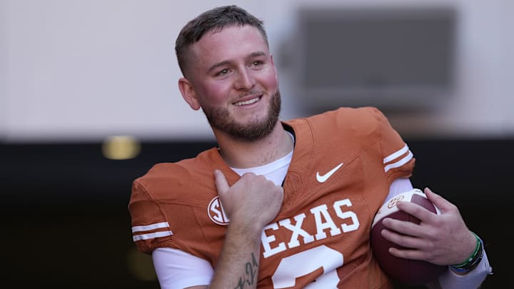 Nov 23, 2024; Austin, Texas, USA; Texas Longhorns quarterback Quinn Ewers (3) prepares to enter the field to be honored for senior day before a game against the Kentucky Wildcats at Darrell K Royal-Texas Memorial Stadium. Mandatory Credit: Scott Wachter-Imagn Images