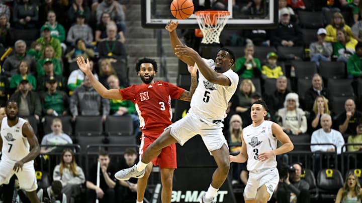 Feb 2, 2025; Eugene, Oregon, USA; Oregon Ducks guard TJ Bamba (5) intercepts a Nebraska pass during the first half at Matthew Knight Arena.