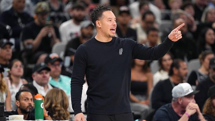 May 12, 2026; San Antonio, Texas, USA; San Antonio Spurs head coach Mitch Johnson signals to players during the first half of game five of the second round of the 2026 NBA Playoffs against the Minnesota Timberwolves at Frost Bank Center. Mandatory Credit: Scott Wachter-Imagn Images