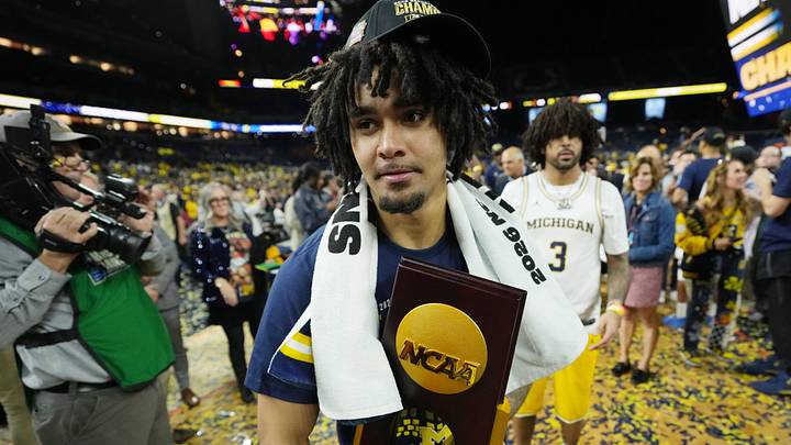 Apr 6, 2026; Indianapolis, IN, USA; Michigan Wolverines guard Elliot Cadeau (3) celebrates after their win against the UConn Huskies in the national championship of the Final Four of the men's 2026 NCAA Tournament between the  and the Michigan Wolverines at Lucas Oil Stadium. Mandatory Credit: Bob Donnan-Imagn Images