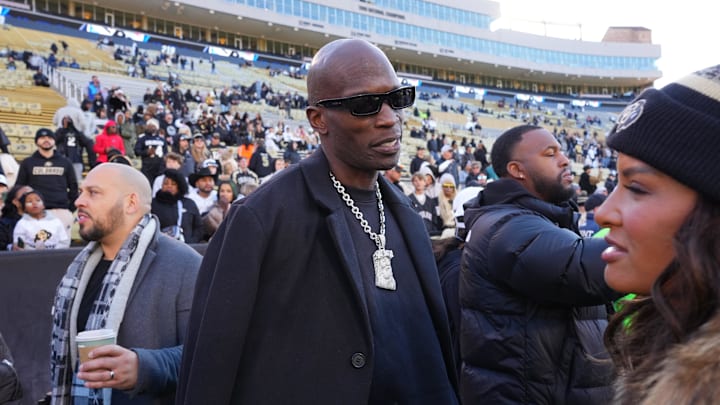 Nov 16, 2024; Boulder, Colorado, USA; Retired American football player Chad Johnson on the sidelines before the game between the Utah Utes against the Colorado Buffaloes at Folsom Field. Mandatory Credit: Ron Chenoy-Imagn Images