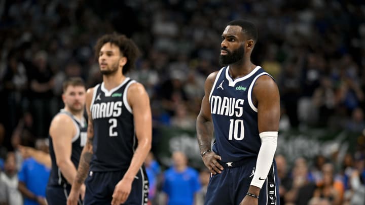 May 13, 2024; Dallas, Texas, USA; Dallas Mavericks guard Luka Doncic (77) and center Dereck Lively II (2) and forward Tim Hardaway Jr. (10) look on during the second half against the Oklahoma City Thunder in game four of the second round for the 2024 NBA playoffs at American Airlines Center. Mandatory Credit: Jerome Miron-USA TODAY Sports