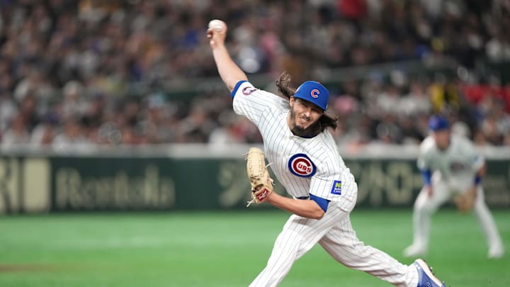 Chicago Cubs pitcher Eli Morgan (33) throws a pitch against the Hanshin Tigers during the fifth inning at Tokyo Dome on March 15.