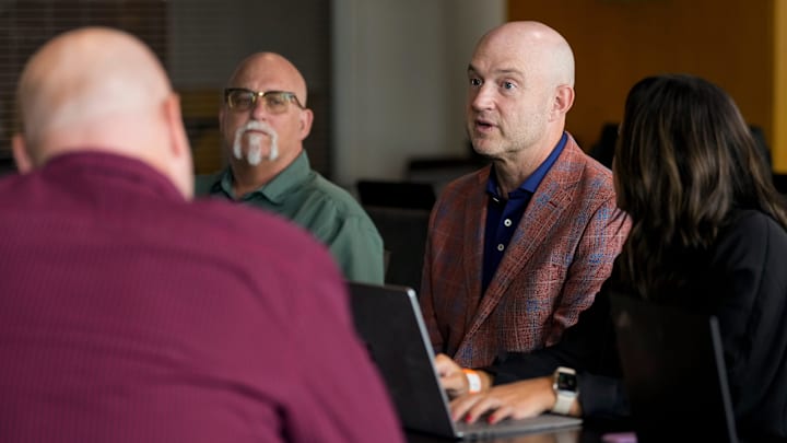Duke Tobin, director of player personnel, takes questions from reporters during the annual Cincinnati Bengals season kickoff luncheon at Paycor Stadium in downtown Cincinnati on Monday, July 22, 2024.