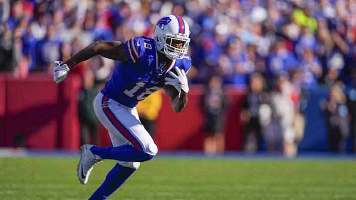 Oct 20, 2024; Orchard Park, New York, USA; Buffalo Bills wide receiver Amari Cooper (18) runs with the ball after making a catch against the Tennessee Titans during the second half at Highmark Stadium. Mandatory Credit: Gregory Fisher-Imagn Images