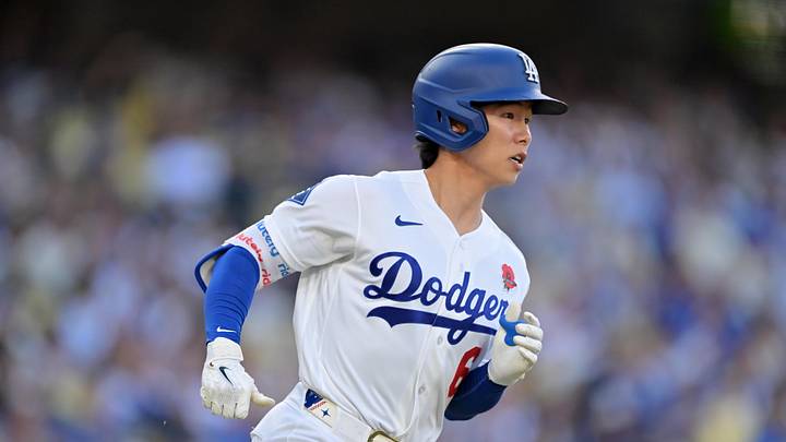 May 25, 2026; Los Angeles, California, USA; Los Angeles Dodgers second baseman Hyeseong Kim (6) runs after hitting a single against the Colorado Rockies in the third inning at Dodger Stadium. Mandatory Credit: Jayne Kamin-Oncea-Imagn Images