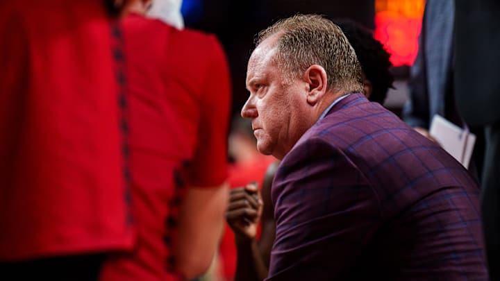 Dec 10, 2025; Lincoln, Nebraska, USA; Wisconsin Badgers head coach Greg Gard sits during a timeout in the first half against the Nebraska Cornhuskers at Pinnacle Bank Arena.