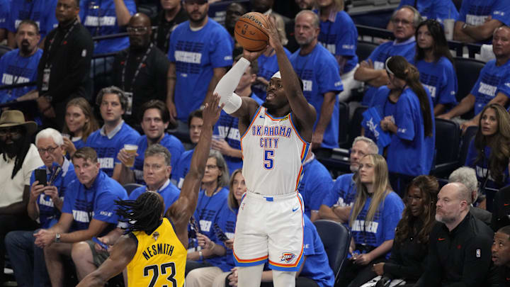 Jun 16, 2025; Oklahoma City, Oklahoma, USA; Oklahoma City Thunder guard Luguentz Dort (5) shoots against Indiana Pacers forward Aaron Nesmith (23) during the third quarter of game five of the 2025 NBA Finals at Paycom Center. Mandatory Credit: Kyle Terada-Imagn Images Jun 16, 2025; Oklahoma City, Oklahoma, USA; Oklahoma City Thunder guard Luguentz Dort (5) shoots against Indiana Pacers forward Aaron Nesmith (23) during the third quarter of game five of the 2025 NBA Finals at Paycom Center. Mandatory Credit: Kyle Terada-Imagn Images