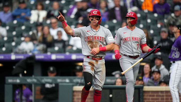 May 15, 2023; Denver, Colorado, USA; Cincinnati Reds shortstop Matt McLain (9) celebrates scoring a run in the third inning against the Colorado Rockies at Coors Field. Mandatory Credit: Ron Chenoy-Imagn Images