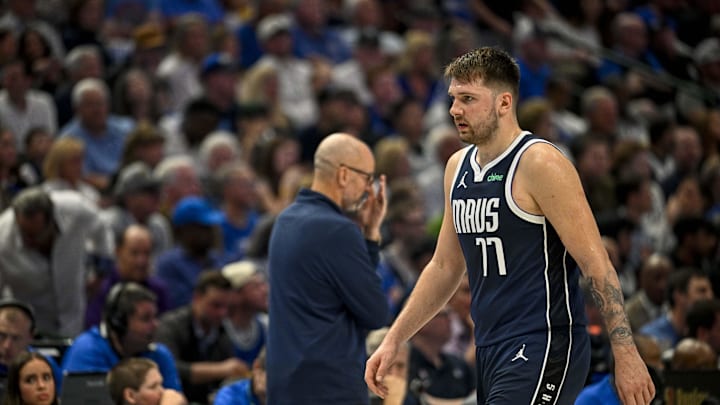 May 13, 2024; Dallas, Texas, USA; Dallas Mavericks guard Luka Doncic (77) walks off the court past head coach Jason Kidd during the second half against the Oklahoma City Thunder in game four of the second round for the 2024 NBA playoffs at American Airlines Center. Mandatory Credit: Jerome Miron-Imagn Images