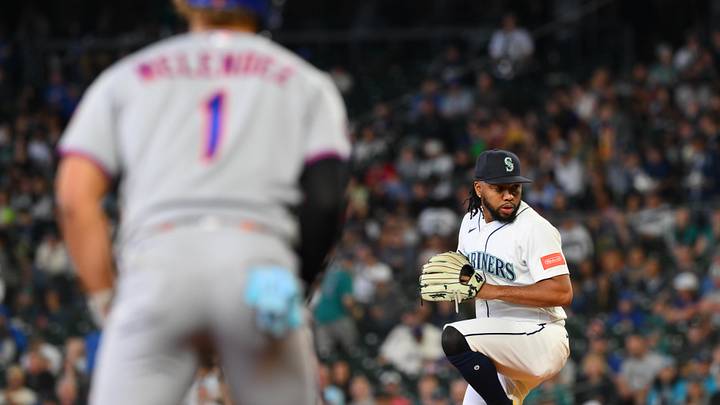 Jun 3, 2026; Seattle, Washington, USA; Seattle Mariners relief pitcher Eduard Bazardo (83) pitches while New York Mets left fielder MJ Melendez (1) leads off third base during the fifth inning at T-Mobile Park. Mandatory Credit: Steven Bisig-Imagn Images Jun 3, 2026; Seattle, Washington, USA; Seattle Mariners relief pitcher Eduard Bazardo (83) pitches while New York Mets left fielder MJ Melendez (1) leads off third base during the fifth inning at T-Mobile Park. Mandatory Credit: Steven Bisig-Imagn Images