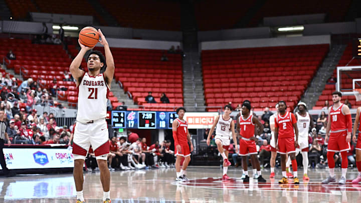 Oct 25, 2025; Pullman, WA, USA; Washington State Cougars guard Ace Glass Lll (21) shoots a technical foul against the New Mexico Lobos in the first half at Friel Court at Beasley Coliseum. Mandatory Credit: James Snook-Imagn Images