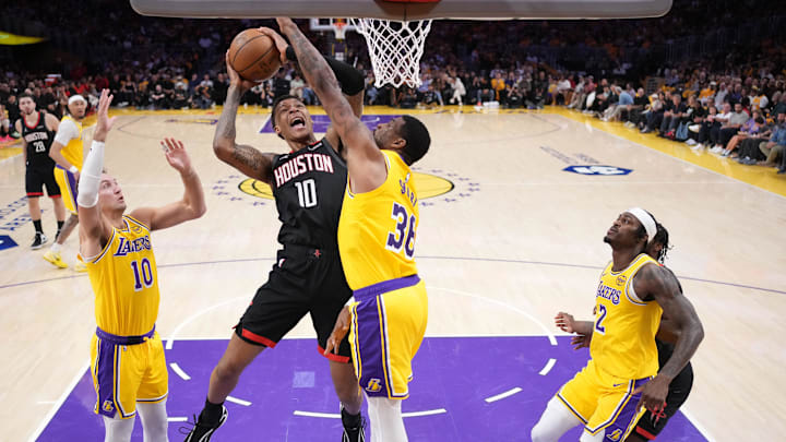 Apr 18, 2026; Los Angeles, California, USA; Houston Rockets forward Jabari Smith Jr. (10) shoots the ball against l10 and guard Marcus Smart (36) in the first half during game one of the first round of the 2026 NBA Playoffs at Crypto.com Arena. Mandatory Credit: Kirby Lee-Imagn Images