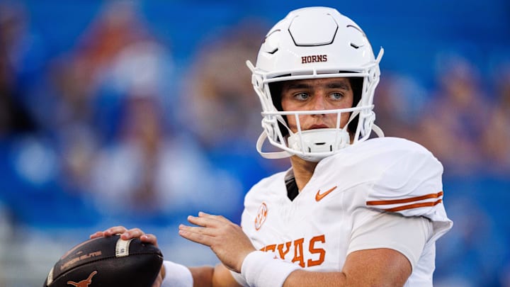 Texas Longhorns quarterback Arch Manning warms up before a game. Texas Longhorns quarterback Arch Manning warms up before a game.